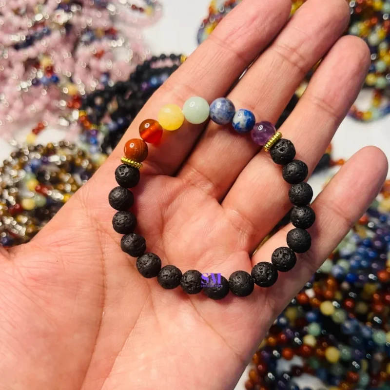 7 Chakra bracelet with lava image in hand